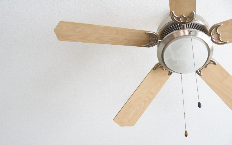 a ceiling fan in a room