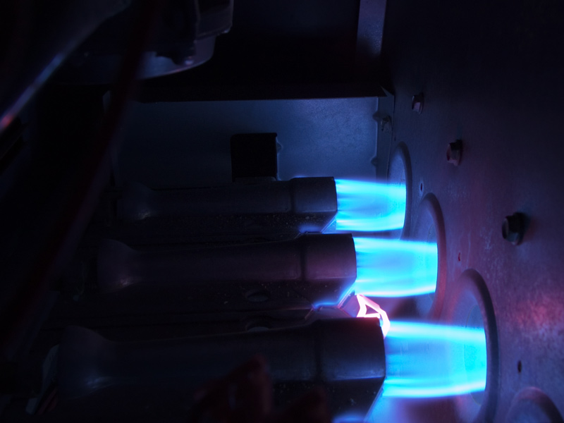 blue flames inside a furnace