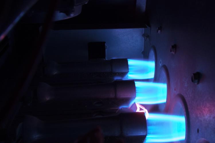 blue flames inside a furnace